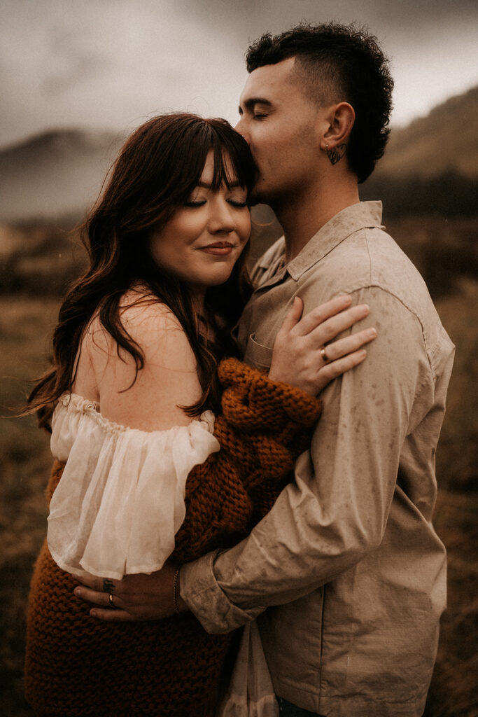 A couple posing in breckenridge colorado for their intimate and romantic couples photos