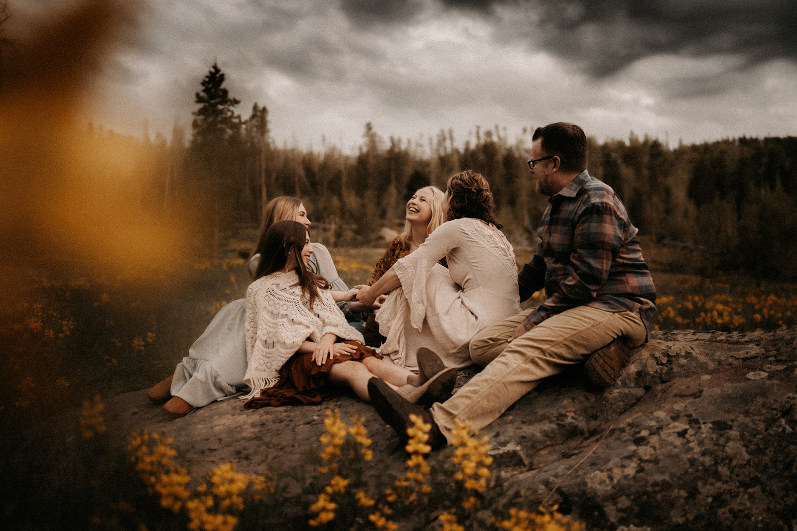 a family posing for a photoshoot at lake granby in Colorado - colorado family photography
